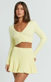 Naomi Two Piece Set - Contrast Knit Button Up Long Sleeve And Pleated Mini Skirt in Lemon